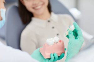 dentist explaining tooth extraction 2021 09 24 03 53 50 utc 1