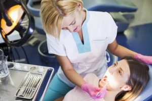 dentist examining patient s teeth 2022 01 25 00 25 58 utc 1