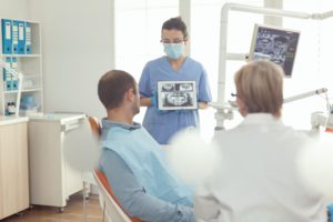 orthodontist nurse holding digital tablet with too 2021 10 27 20 25 17 utc 1