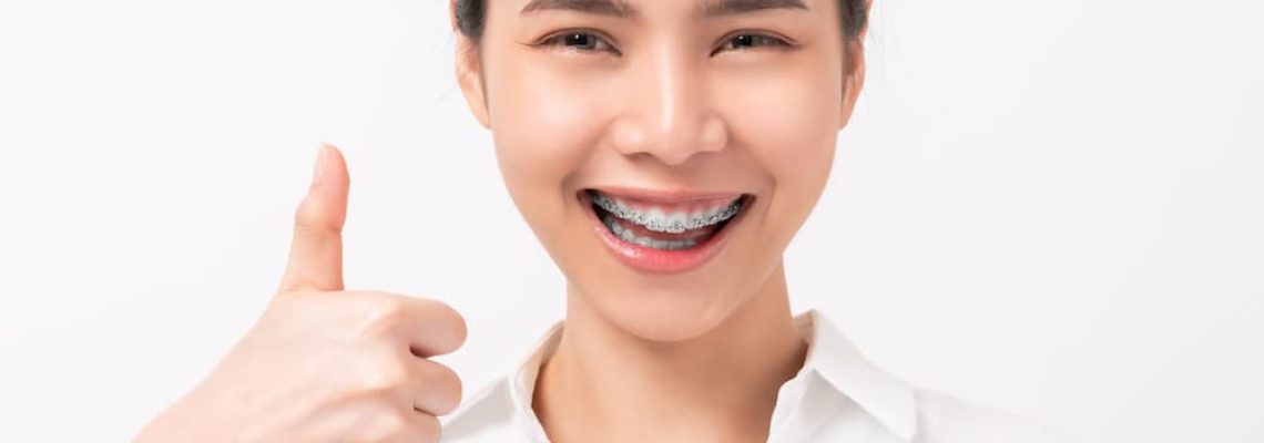 smiling-asian-woman-and-showing-thumbs-up-or-like-2021-09-01-18-14-37-utc (1)